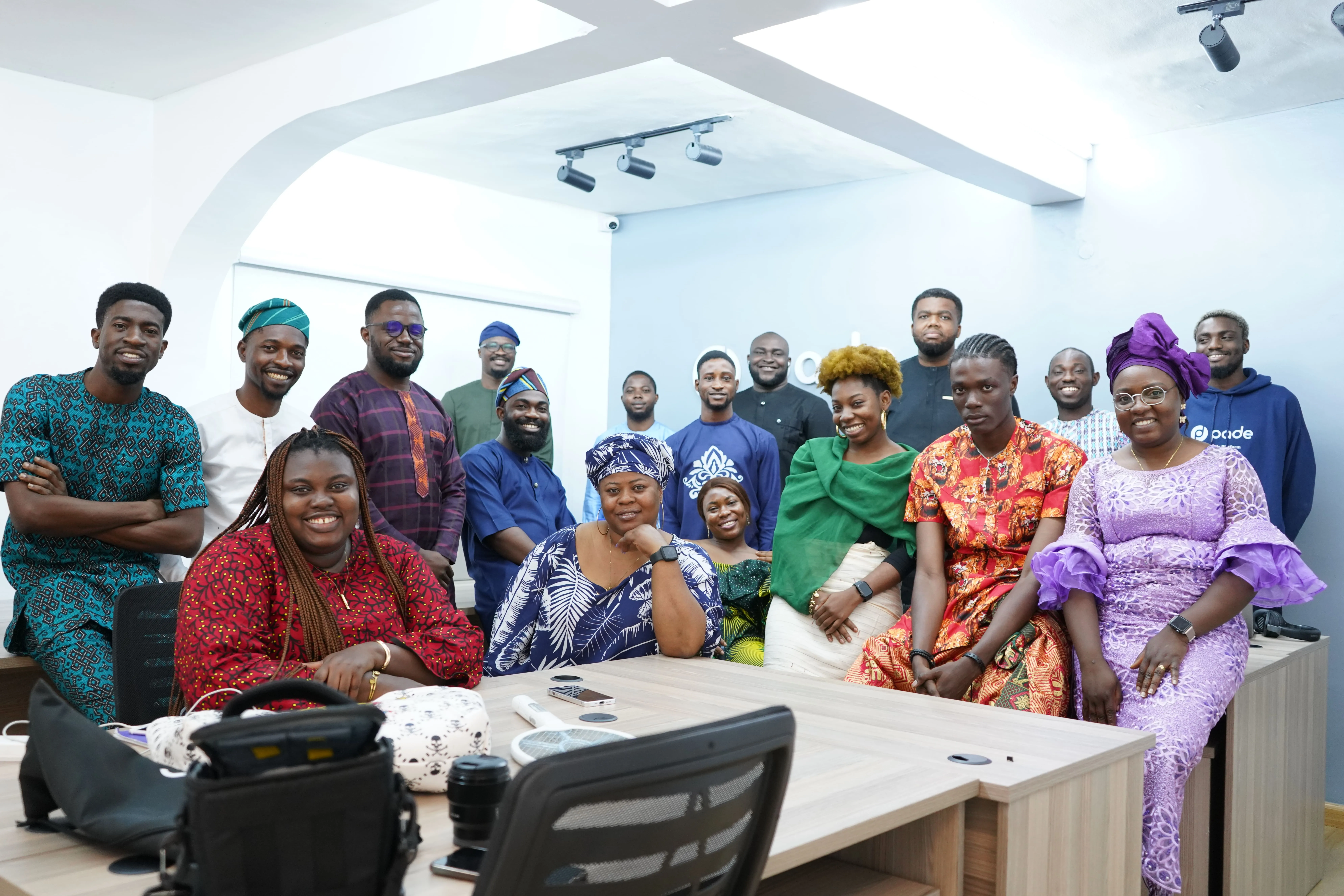 A group of people sitting around a table.