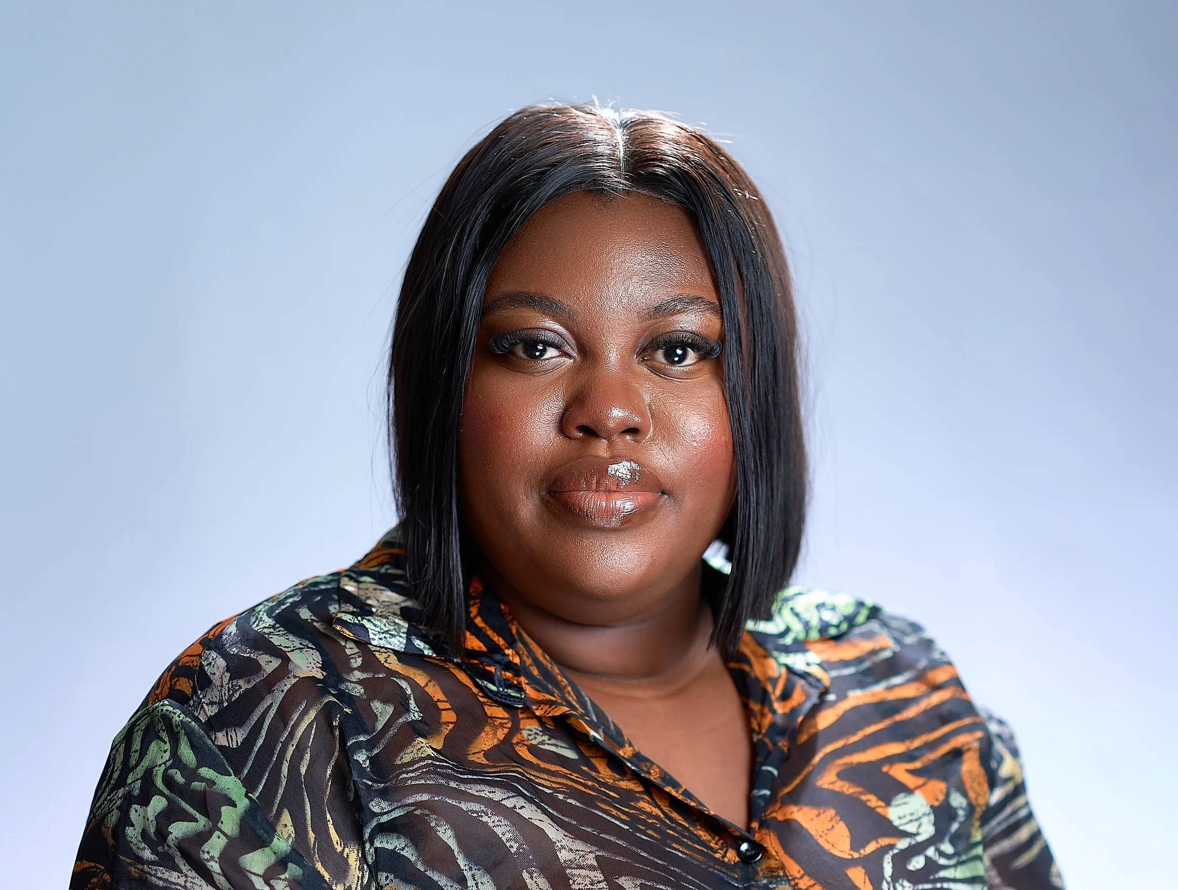 A picture of Ola Igwe posing for a picture.